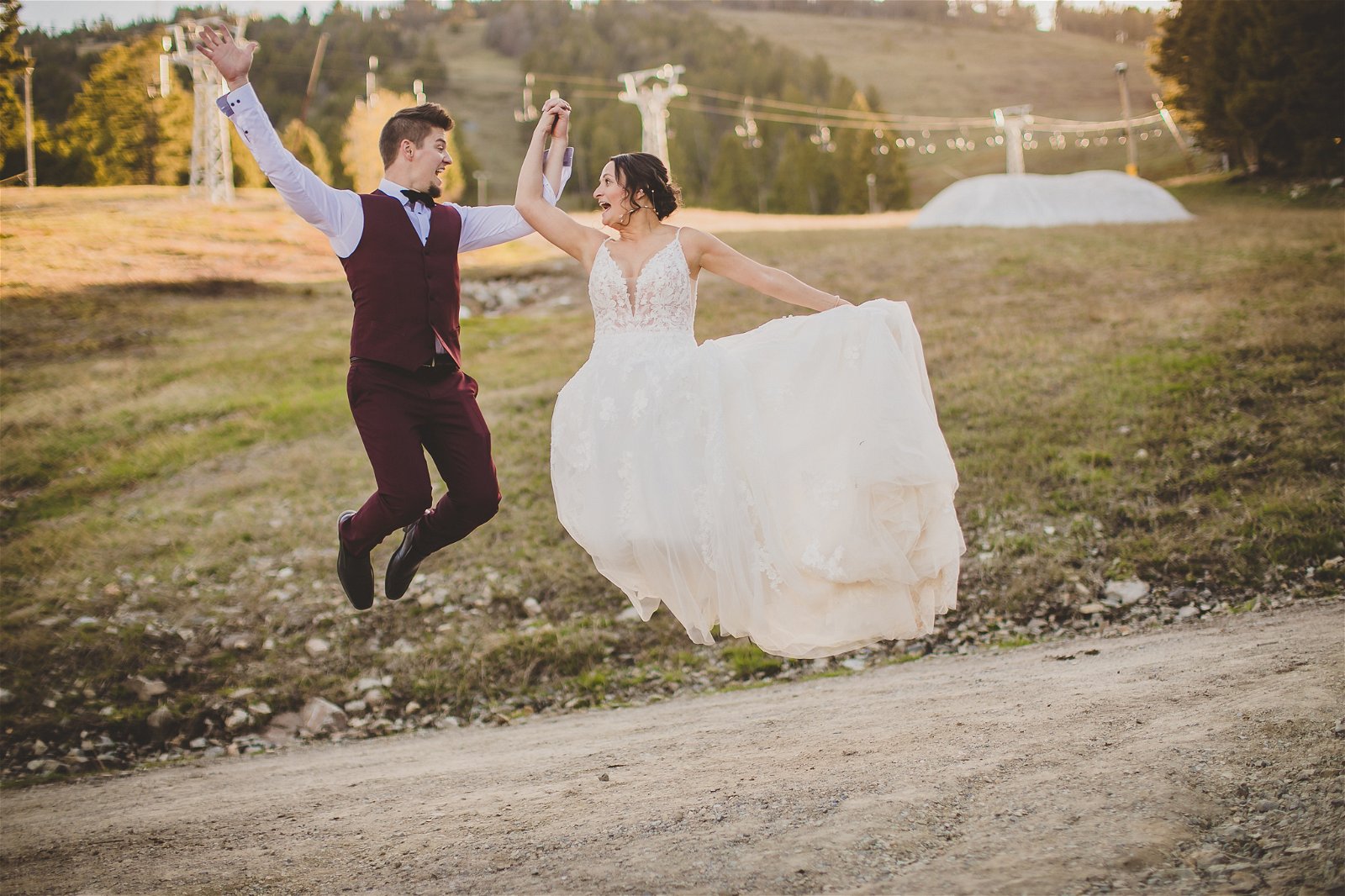 Happy couple jumps for joy 
